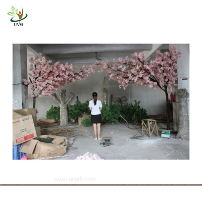 China UVG Wooden artificial wedding tree with silk cherry blossom for party stage decoration supplier