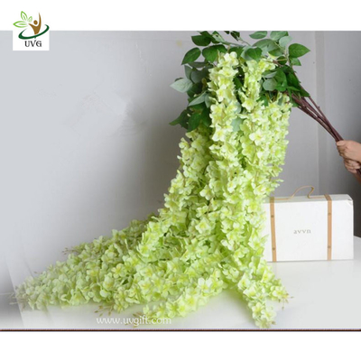 China UVG Green decorative artificial flower with silk wisteria for wedding stage decoration supplier