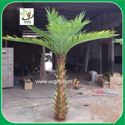 China UVG PTR027 hotel use natural bark small artificial palm tree for decor supplier