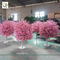 UVG 5ft cheap artificial trees with fake peach blossoms for wedding table center pieces supplier
